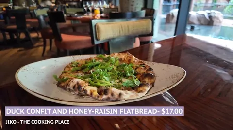 Duck confit and honey raisin flatbread at Jiko