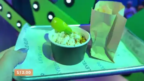 Guacamole elote dip with chips at Level 99